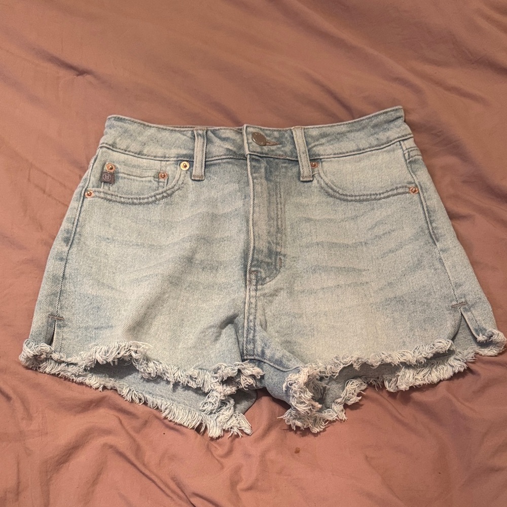 Junior’s JUSTUSA Light Blue Frayed Jean Shorts
